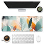 Eflxamz Desk Pad, Abstract Colorful Leaves Desk Mat, Large Gaming Mouse Pad with Non-Slip Base and Stitched Edge, 31.5"x11.8"